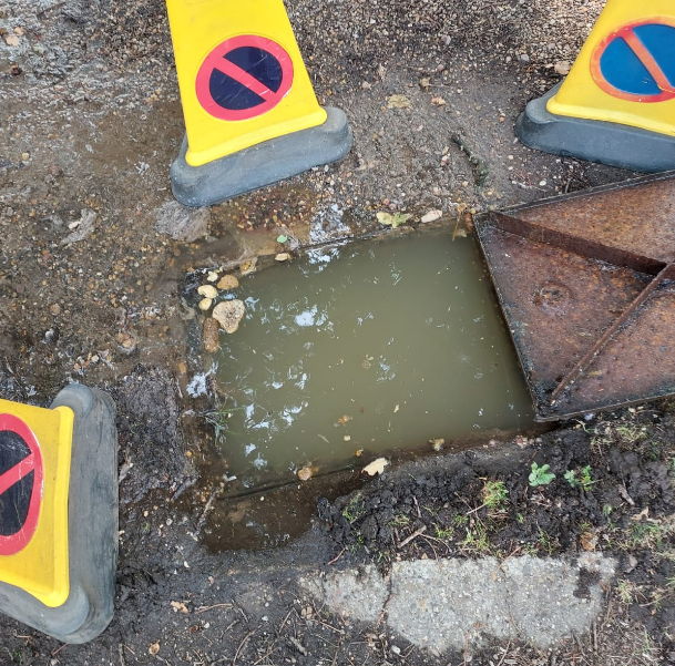 Photo of blocked drain manhole